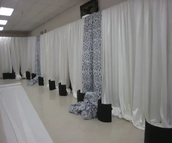 how to cover walls with fabric for a party