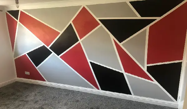 garage accent wall with geometric wall art