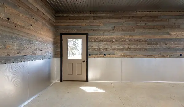 garage accent wall with salvage wood panels