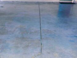 how to repair pitted concrete garage floor