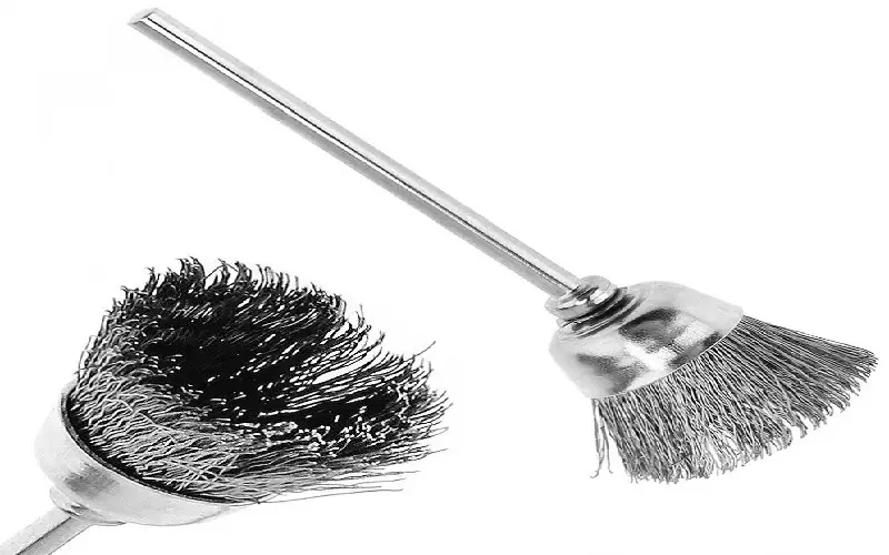 vacuum the area with a wire brush
