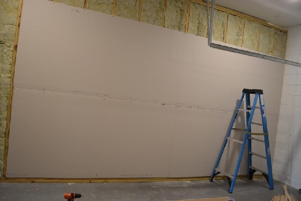 start installing drywall