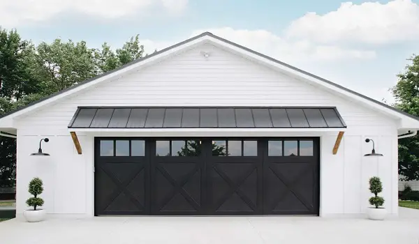horizontal slats black garage door white house