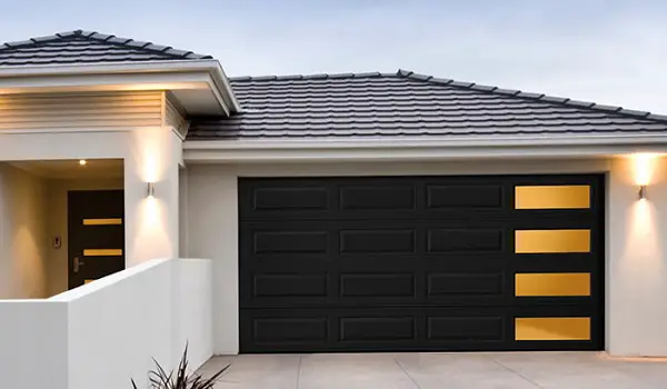 modern and minimalist black garage door white house