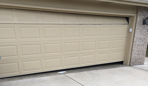 crooked garage door fix