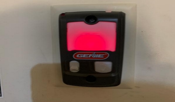 red light on the Genie wall console