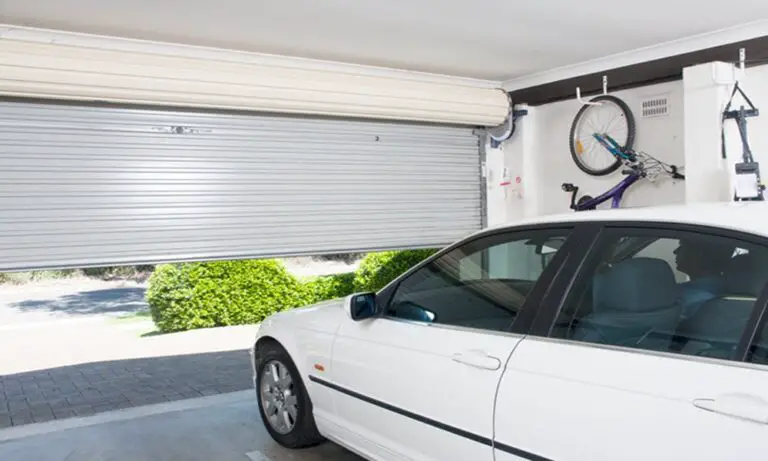 garage door keeps going back up