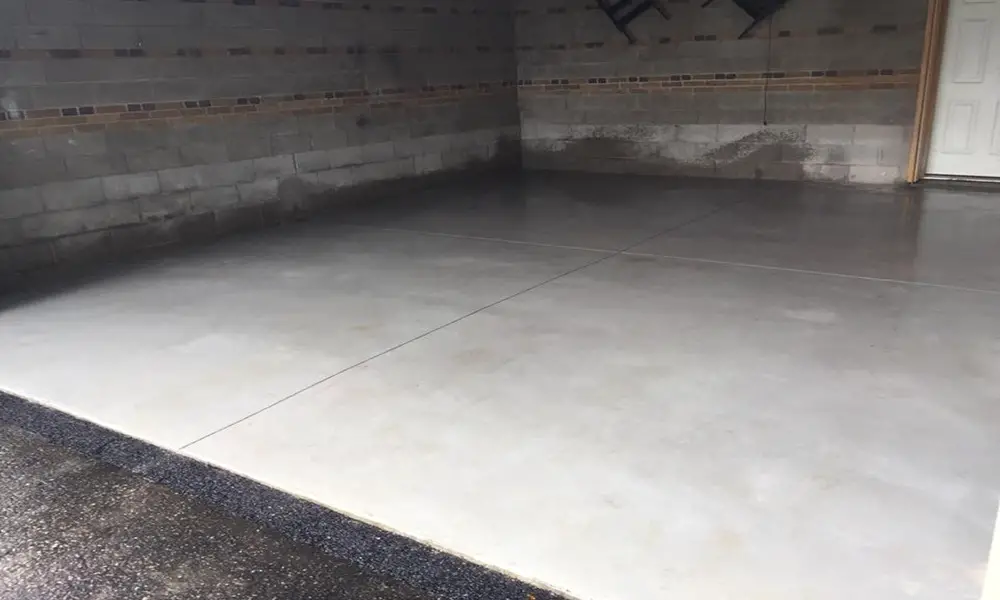 water seeping up through concrete garage floor
